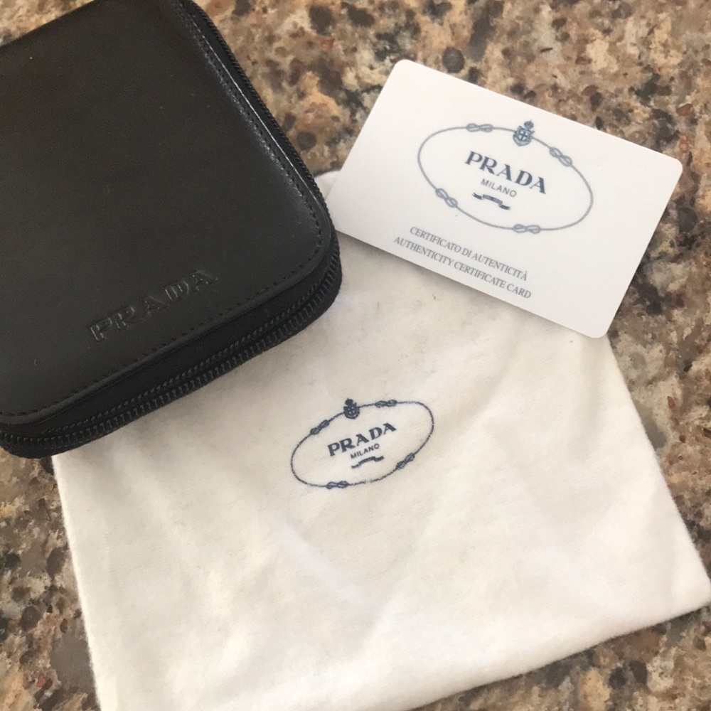 Prada MENS black wallet never used